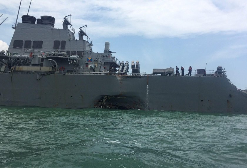 The U.S. Navy guided-missile destroyer USS John S. McCain is seen after a collision, in Singapore wa