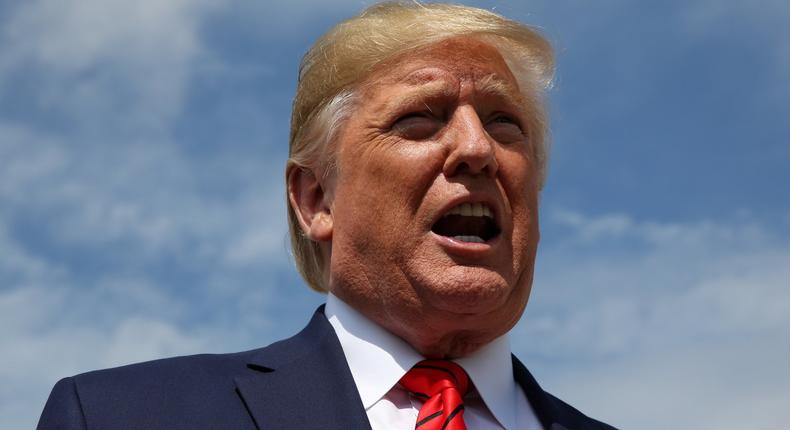 U.S. President Donald Trump speaks to reporters after arriving aboard Air Force One at Joint Base Andrews, Maryland, U.S. September 26, 2019. REUTERS/Jonathan Ernst