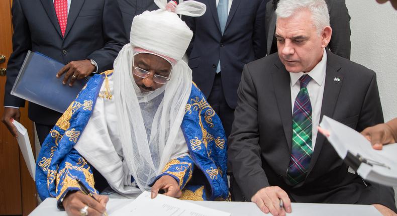 Emir of Kano, Muhammadu Sanusi II and Paul McGrath, Lead Country Manager, ExxonMobil during signing of QIPP in 2017