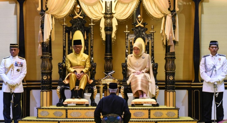 Sports-loving Sultan Abdullah (L), who is the new ruler of Pahang state, is expected to be elected king by Malaysia's royal families