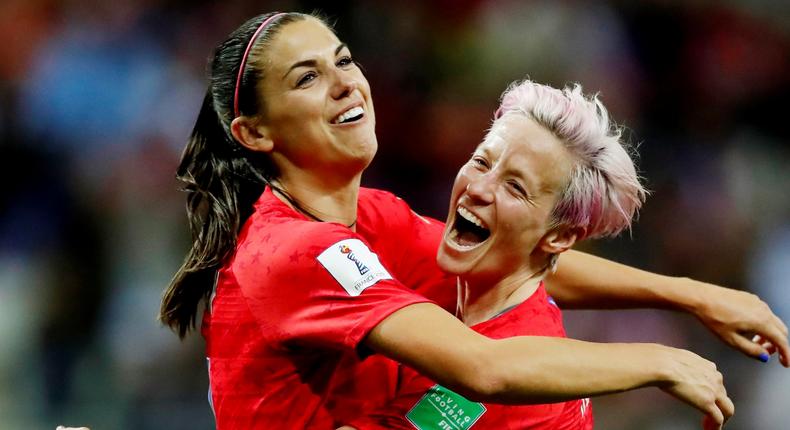 Soccer Football - Women's World Cup - Group F - United States v Thailand - Stade Auguste-Delaune, Reims, France - June 11, 2019  Alex Morgan of the U.S. celebrates scoring their twelfth goal with Megan Rapinoe  REUTERS/Christian Hartmann