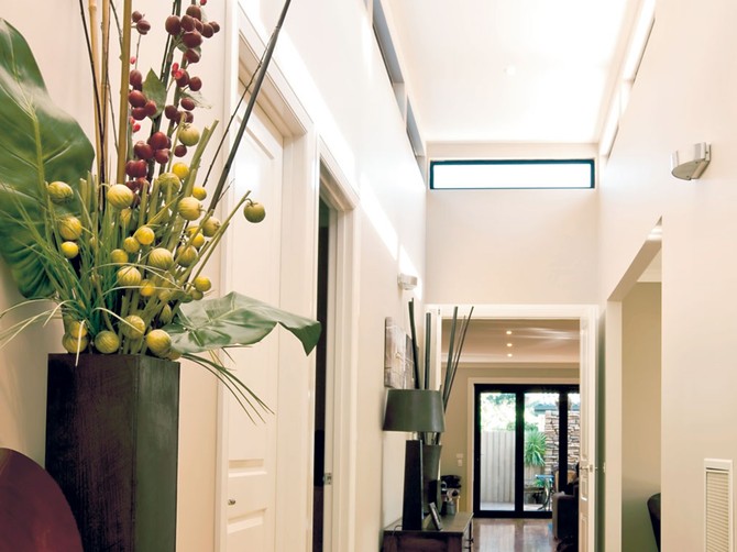 12697_stock-photo-entrance-hall-of-new-showcase-home-with-polished-floorboards-and-elegant-decor-shutterstock_30197470