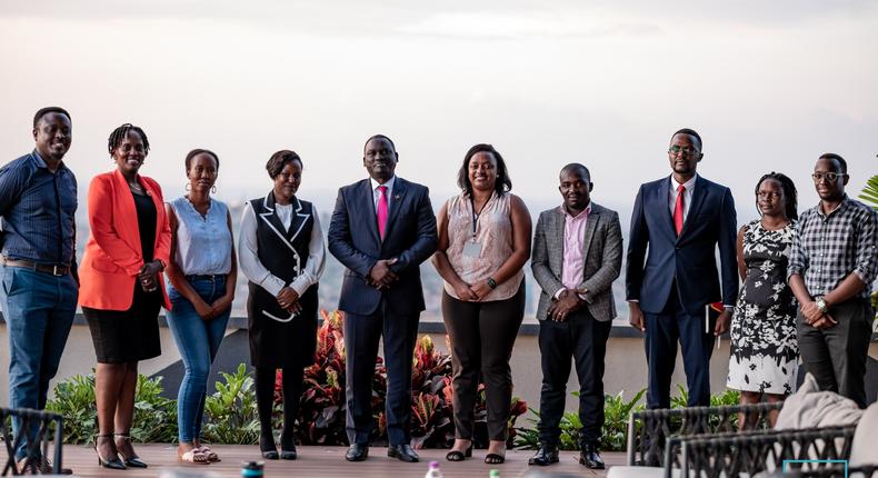 Uganda Marketer's Society newly constituted UMS Executive Committee posing for a photo with Next Media Group CEO, Kin Kariisa (center)