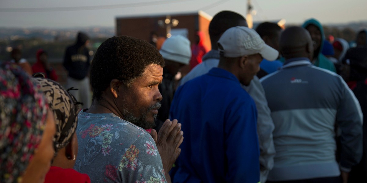 People queue at a voting station during South Africa's local government elections in Umlazi, Durban, South Africa, August 3, 2016.