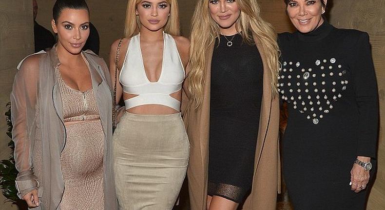 A blonde Kylie Jenner along with her sisters, Kim and Khloe Kardashian and their mother, Kris Jenner at their app launch