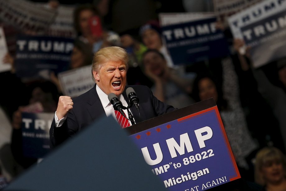 Republican US presidential candidate Donald Trump speaks to supporters during a campaign rally in Warren, Michigan, March 4, 2016.