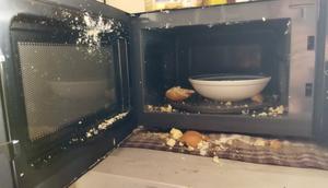 Why eggs explode when put in the microwave