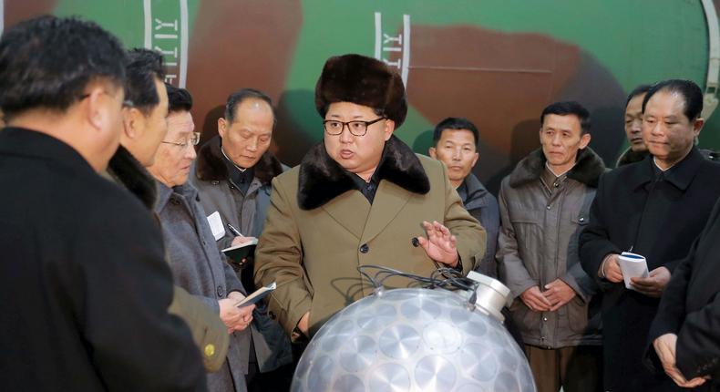 North Korean leader Kim Jong Un meeting with scientists and technicians who study nuclear weapons.