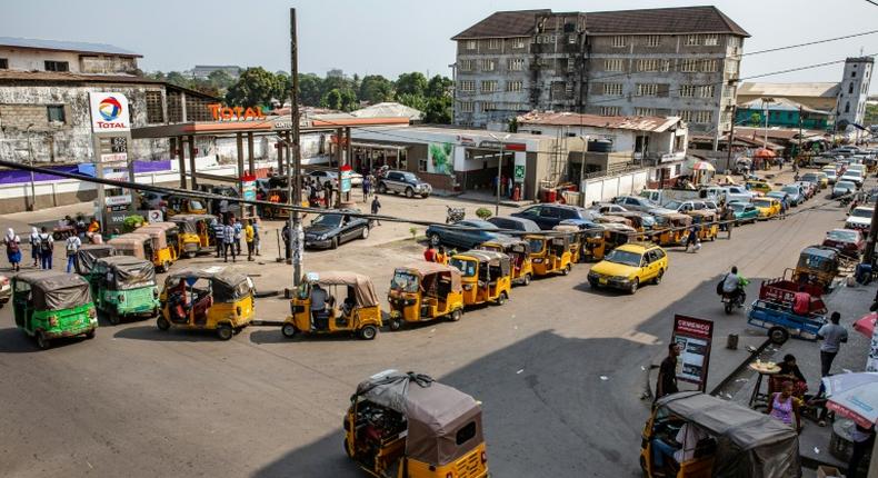 Cars and tuk-tuk taxis often need to wait for hours at fuel stations as Liberia experience petrol a shortage