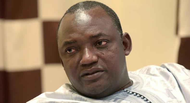 Gambian president-elect Adama Barrow, seen December 12, 2016, said in a Christmas message, If the colonialists could peacefully hand over executive power... (we) should be able to show a better example to our children