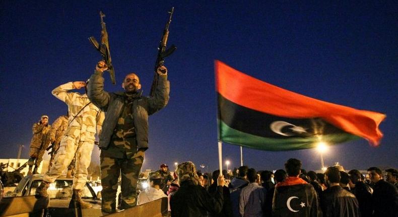 A photo by AFP photographer Abdullah Doma shows Libyans celebrating the sixth anniversary of the Libyan revolution in Benghazi on February 17, 2017