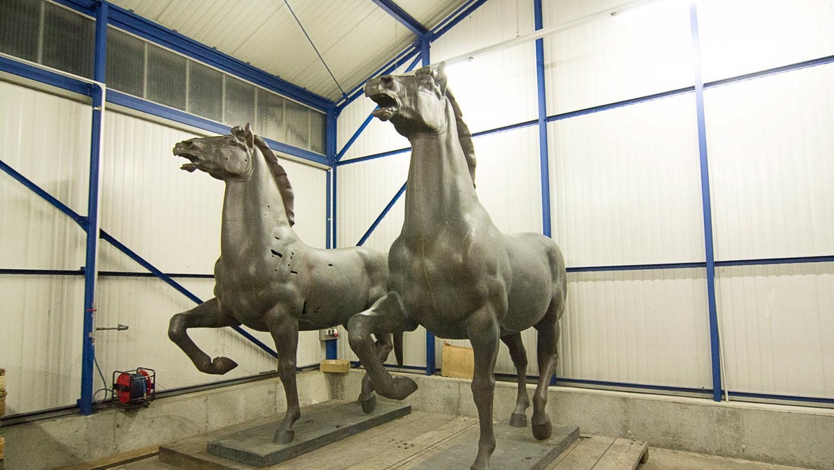 A police handout shows two recovered bronze sculptures made for Adolf Hitler's imposing Reich Chancellery that have been missing for years and are now stored in a police compound in the western German town of Bad Bergzabern