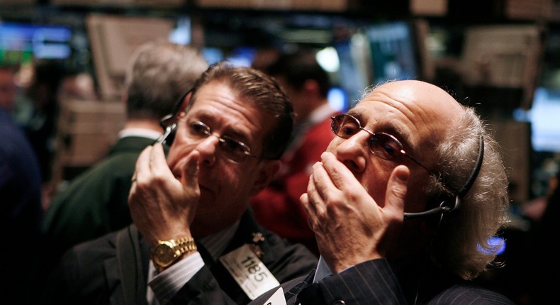 Traders work on the floor of the New York Stock Exchange in New York on November 25, 2008.