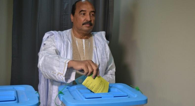 President Mohamed Ould Abdel Aziz of Mauritanian casts his vote in the country 's constitutional referendum on August 5, 2017