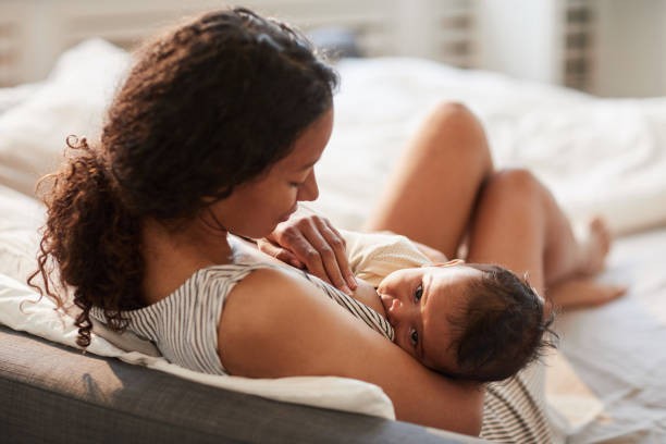 Breastfeed in a more laid back position to reduce the pain