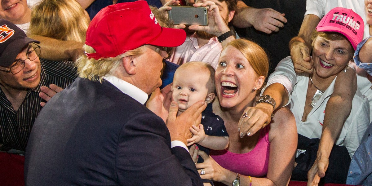 Republican presidential candidate Donald Trump greets supporters after his rally at Ladd-Peebles Stadium on August 21, 2015 in Mobile, Alabama.