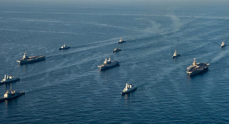 Ships of the Harry S. Truman carrier strike group, the Cavour strike group, and the Charles de Gaulle strike group in the Mediterranean Sea, February 6, 2022.