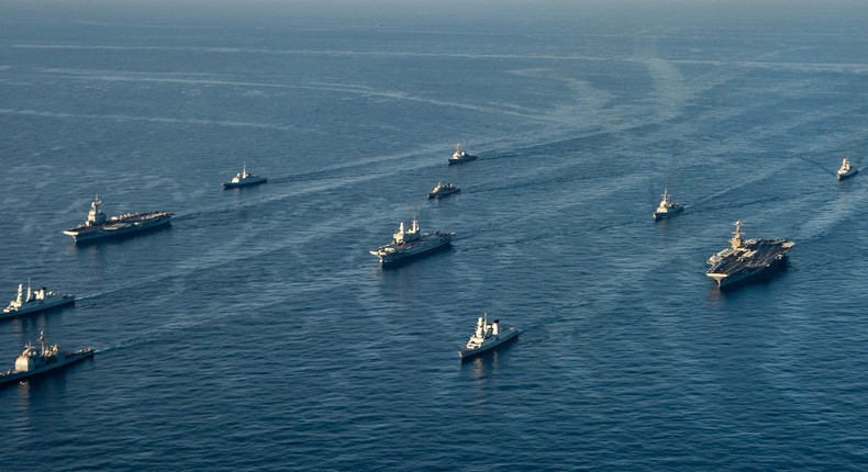 Ships of the Harry S. Truman carrier strike group, the Cavour strike group, and the Charles de Gaulle strike group in the Mediterranean Sea, February 6, 2022.