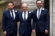 Media Mogul Rupert Murdoch poses for a photograph with his sons Lachlan and James as they arrive at 