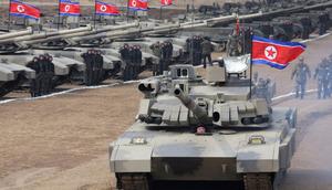 North Korean leader Kim Jong Un sits inside a tank during a military demonstration involving tank units, in North Korea.KCNA via Reuters