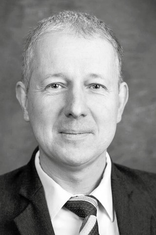 Alex Tokarev, wykładowca ekonomii na Northwood University