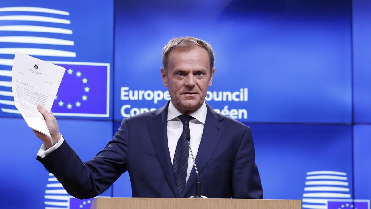 European Council President Donald Tusk holds a news conference after receiving British Prime Ministe