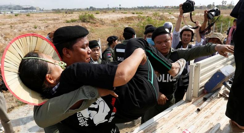 Cambodia frees eight protesters, including two foreigners