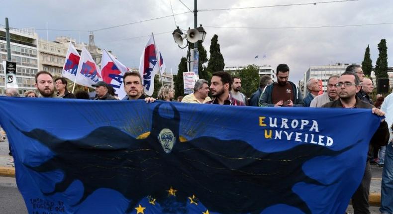 Union workers and pensioners demonstrate against new reforms in the labour sector outside of the Greek Parliament in Athens on October 17, 2016