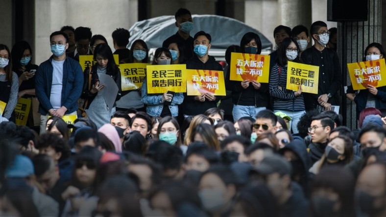 A rally by workers from the advertising sector this week. Violence has lessened in Hong Kong protests following recent local elections