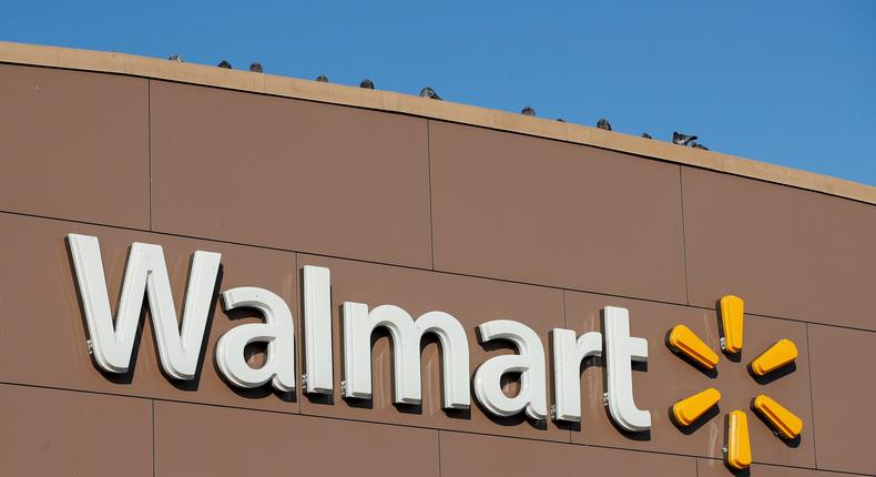 FILE PHOTO: Walmart's logo is seen outside one of the stores in Chicago, Illinois, U.S., November 20, 2018. REUTERS/Kamil Krzaczynski/File Photo