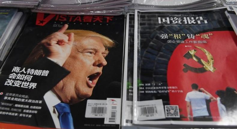 A magazine featuring US President-elect Donald Trump is seen at a bookstore in Beijing on December 12, 2016