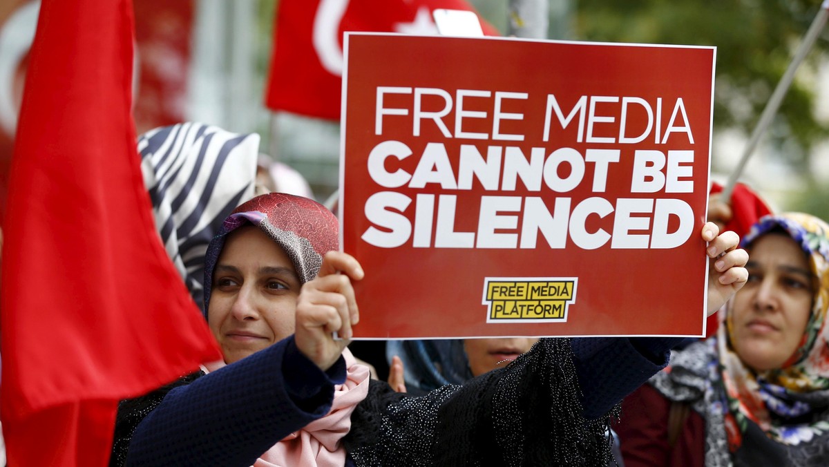 Supporters of Gulen movement shout slogans during a protest outside the Kanalturk and Bugun TV build