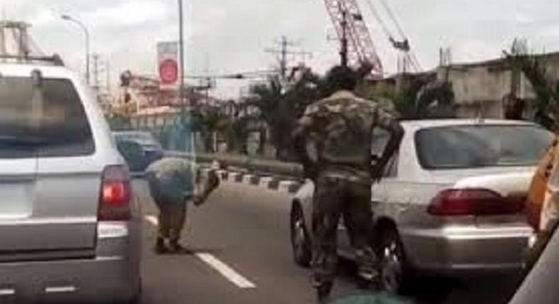 Soldier caught punishing a driver