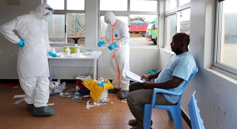 A Kenyan waits to be tested for Covid-19 at a health facility (Photo: Al Jazeera)