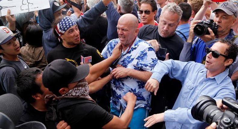 Trump protesters, supporters clash outside California rally