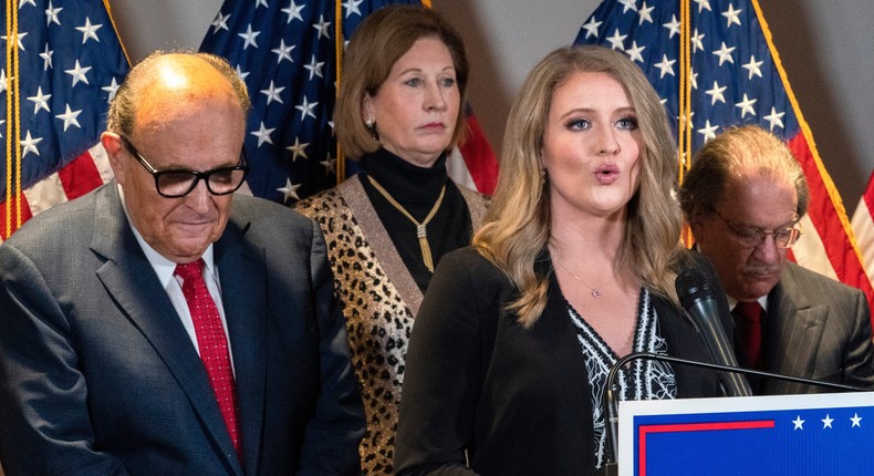 Members of then-President Donald Trump's legal team (left to right), former Mayor of New York Rudy Giuliani, Sidney Powell, and Jenna Ellis, attend a news conference at the Republican National Committee headquarters in Washington, DC, on November 19, 2020.