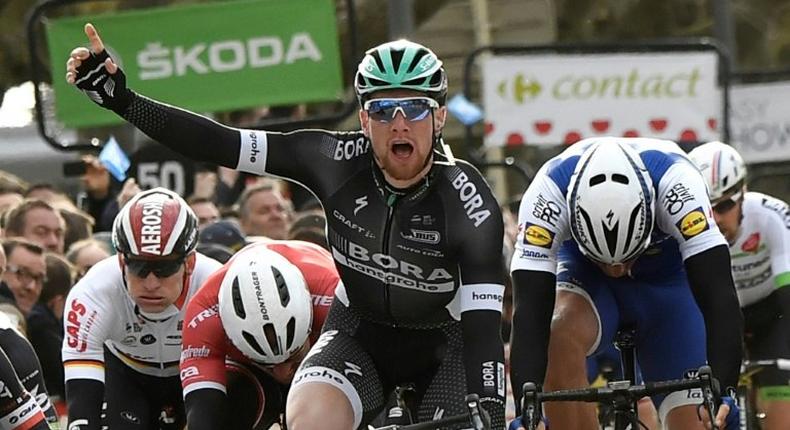 Ireland's Sam Bennett celebrates after winning the third stage of the 75th edition of the Paris-Nice between Chablis and Chalon-sur-Saone, on March 7, 2017