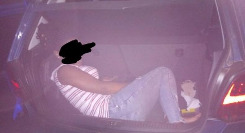 Police arrest man for smuggling woman in his car booth ‘to enhance lockdown experience’