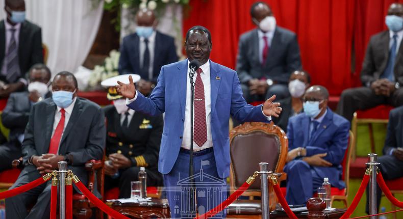 Raila Odinga with President Uhuru Kenyatta at the Bomas of Kenya