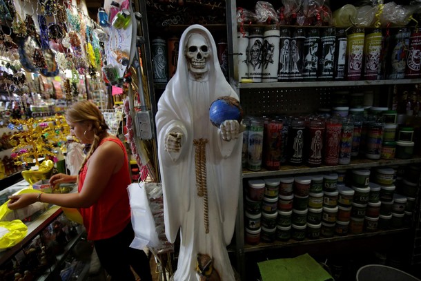 Figure depicting La Santa Muerte (Saint Death) is pictured at a stall of religious ornaments in Ciud