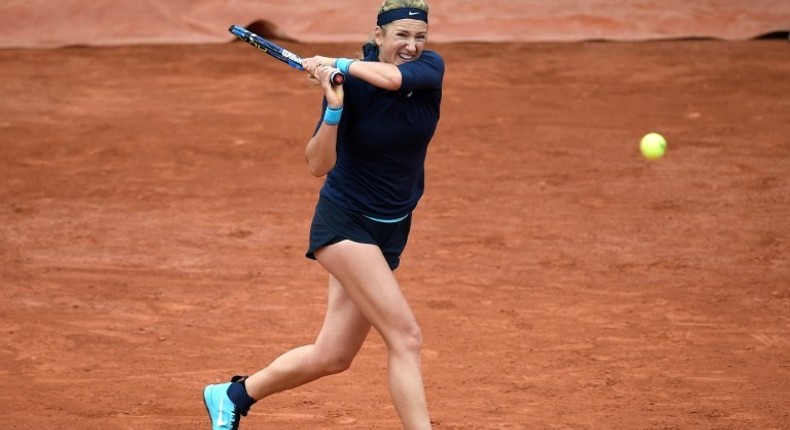 Belarus' Victoria Azarenka returns the ball to Italy's Karin Knapp during their women's first round match at the Roland Garros 2016 French Tennis Open in Paris on May 24, 2016