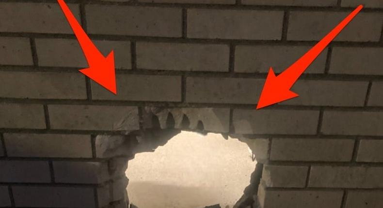A hole made in the wall through the Newport News Jail Annex, where two inmates made their escape using a toothbrush and untied rebar on March 20, 2023.Newport News Sheriffs Office.