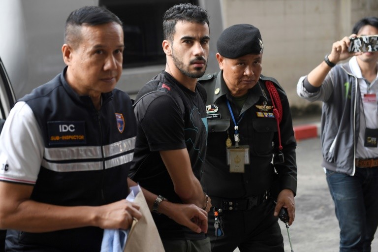 Former Bahrain footballer Hakeem Alaraibi was detained in Bangkok while trying to go on vacation with his wife
