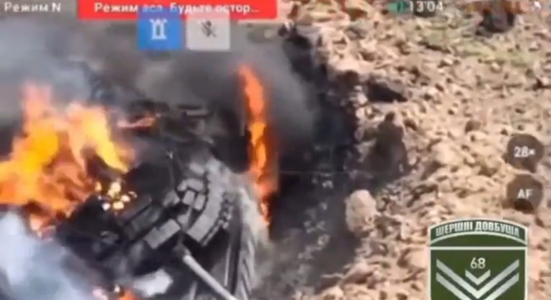 Russian tanks on fire after falling into a crater and being targetted by Ukrainian dronesUkraine's 68th Jaeger Brigade