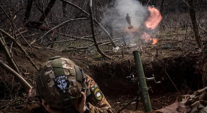 A Ukrainian service member with the 24th Brigade fires an 82mm mortar as fighting continues near Toretsk.Wolfgang Schwan/Anadolu via Getty Images