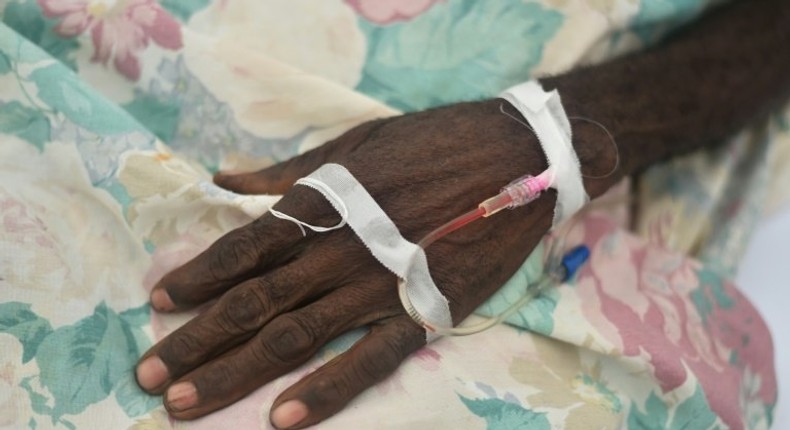 Patients with cholera symptoms receive medical attention in a hospital of field of Samaritan's Purse in Randelle, Haiti, on October 19, 2016