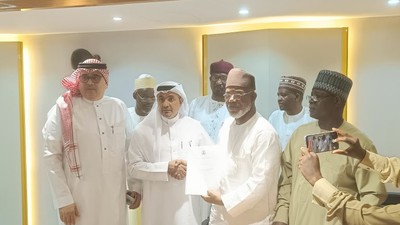 NAHCON boss, Zikrullah Hassan with officials of Flynas after signing agreement.
