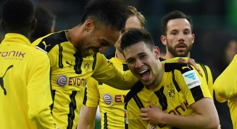 Dortmund's defender Raphael Guerreiro and striker Pierre-Emerick Aubameyang react after a German first division Bundesliga football against Borussia Moenchengladbach on April 22, 2017