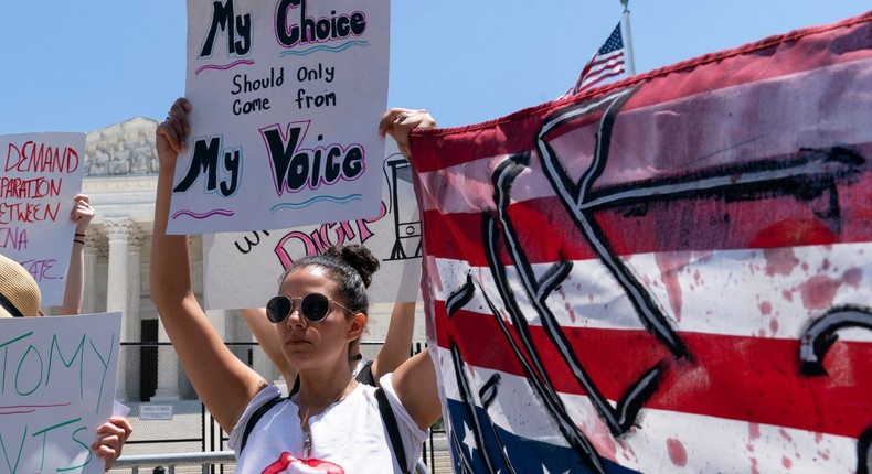 Joanna Liverance, 26, of Detroit, protests with abortion-rights supporters outside of the Supreme Court, Wednesday, June 29, 2022, in Washington, DC.