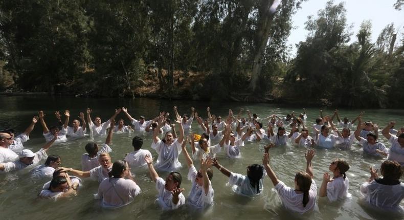 Christians believe Jesus was baptized in the Jordan River by John the Baptist, and many visit the site to take part in mass baptism ceremonies, such as these Brazilian pilgrims in 2016